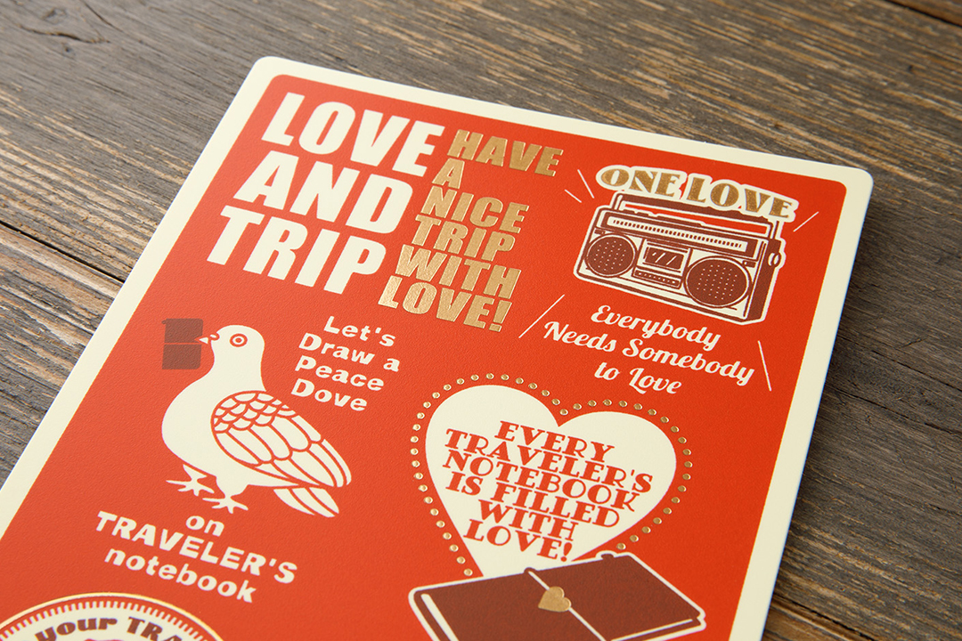 Close up of the red plastic sheet featuring LOVE AND TRIP motifs for 2025 DIARY.