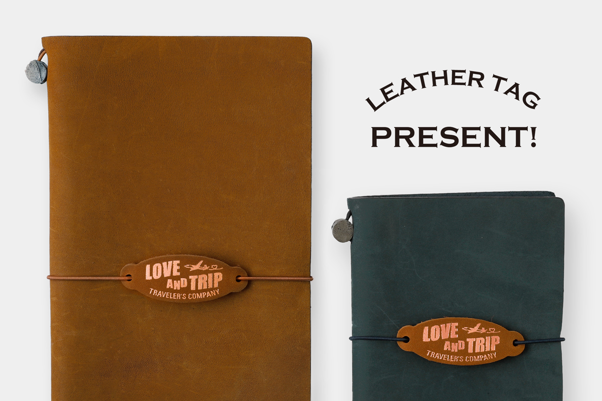 TRAVELER'S notebook with leather tag foil-stamped with "LOVE and TRIP"