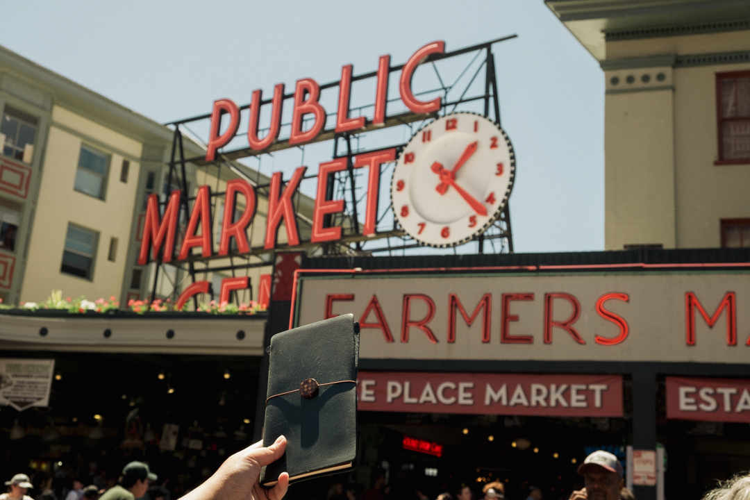 TRAVELER'S notebook with the Public Market sign at Pike Place Market.