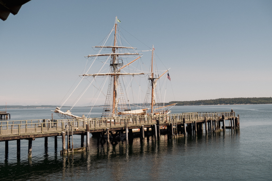 An old sailboat docked at the pier of Port Townsend.