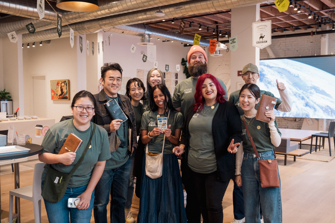 TRC team posing at the Intertrend venue with their notebooks.