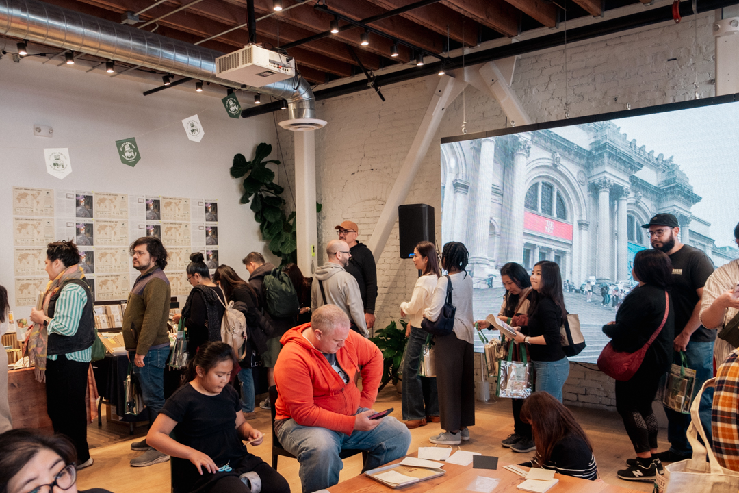 People in queue to shop for TRAVELER'S notebook products at Intertrend.