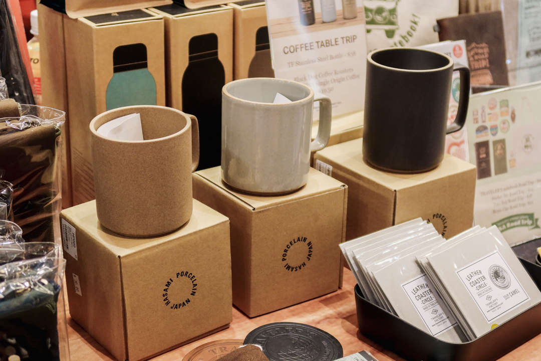 Close up of the Hasami Mugs with the TF Original items TRC USA capsule machine on the TRC USA table at the California Pen Show.