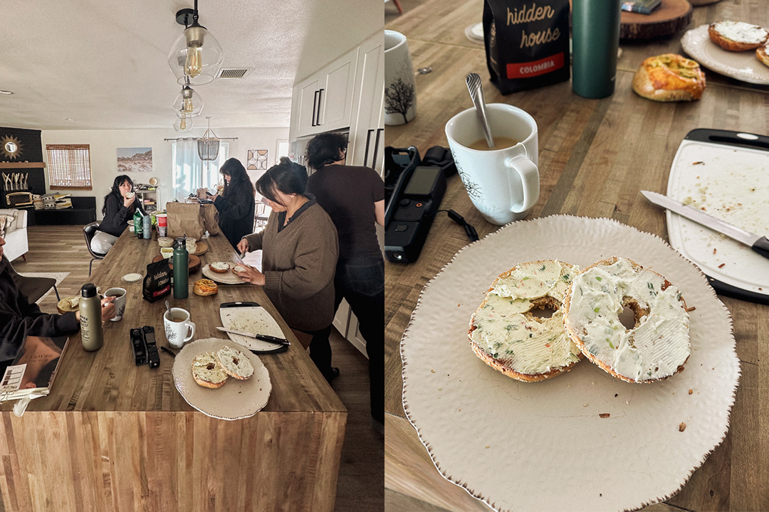 People at a kitchen counter preparing breakfast which consists of coffee and bagels.