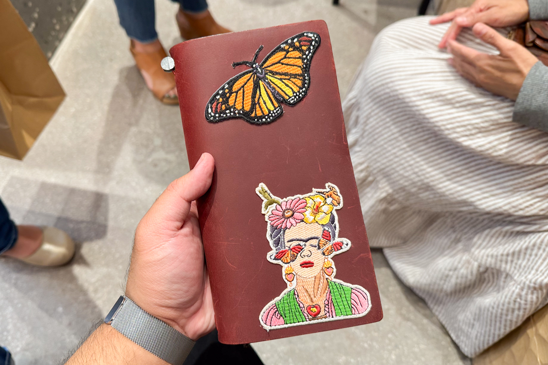 A TRAVELER'S notebook fan's customized TRAVELER'S notebook with patches.