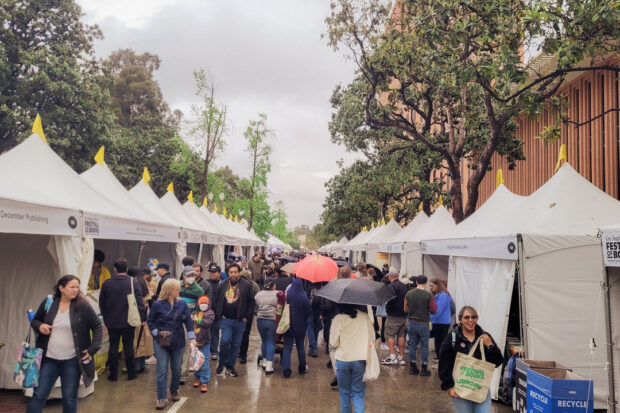 People walking around the LA Times Festival of Books venue at the University of Southern California.