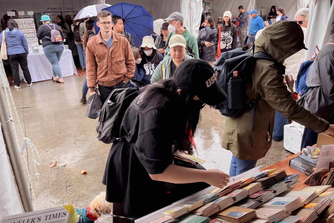 People shopping at the TRC USA booth at the L.A. Times Festival of Books.