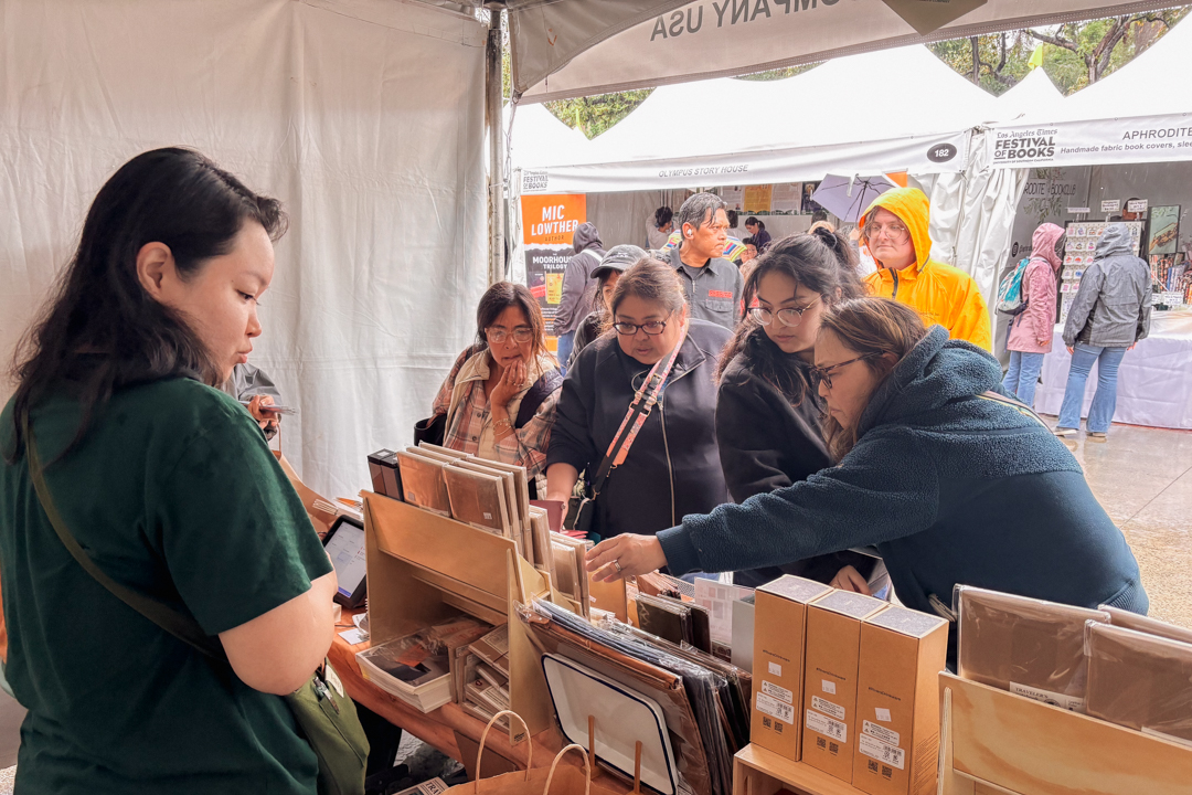 People shopping at the TRC USA booth at the L.A. Times Festival of Books.