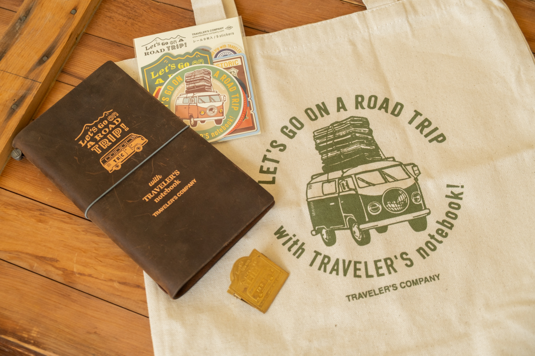 The TRC USA Road Trip Collection TRAVELER'S notebook, sticker set, brass clip, and tote bag.