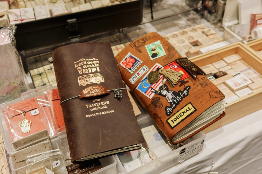 Customized TRAVELER'S notebooks at the TRC USA table at Little Craft Fest.