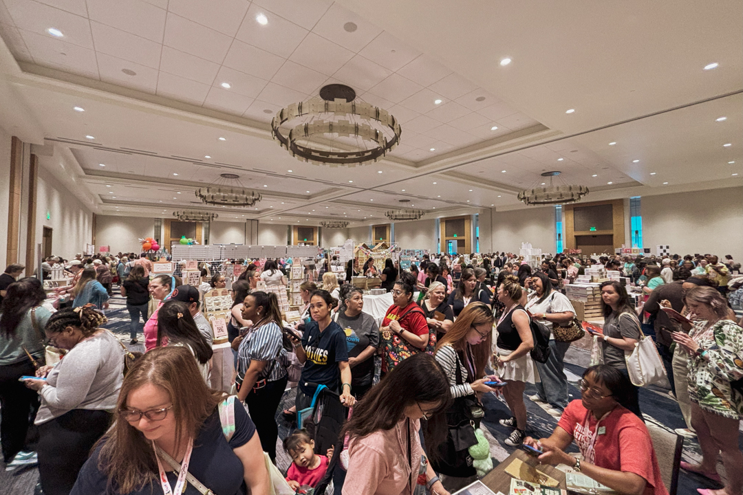 Little Craft Fest ballroom filled with attendees shopping at various booths.