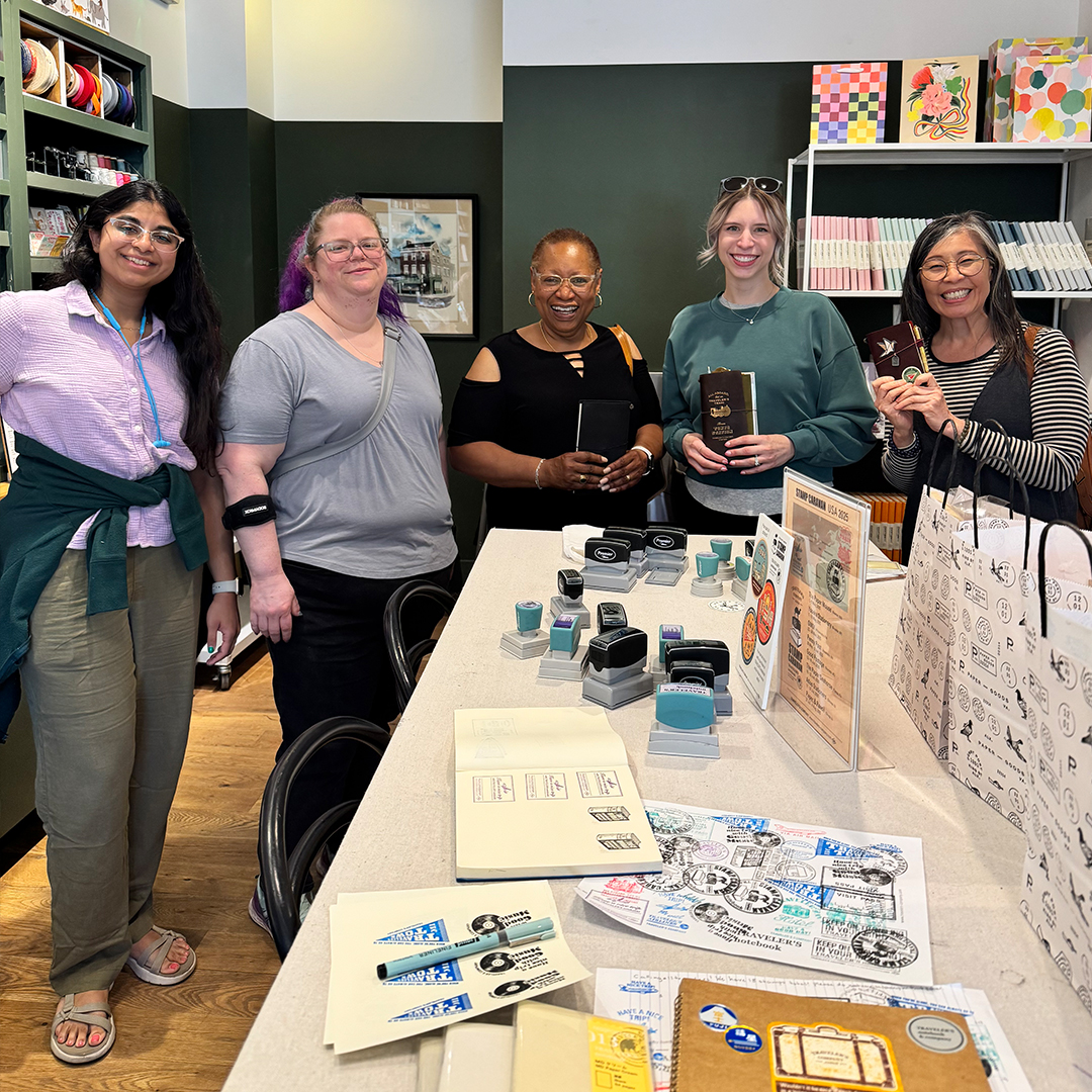 Customers enjoying the stamp caravan at Penny Post.