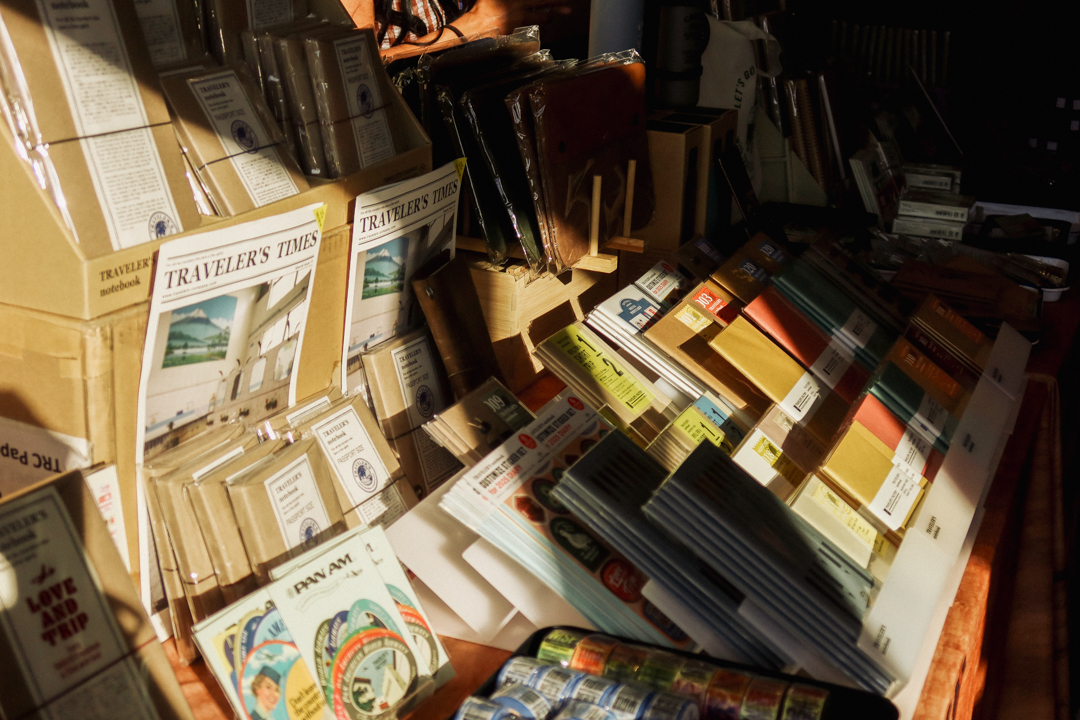 TRAVELER'S COMPANY items, masking tapes, and sticker sets on the TRC USA table at the SF Pen Show.