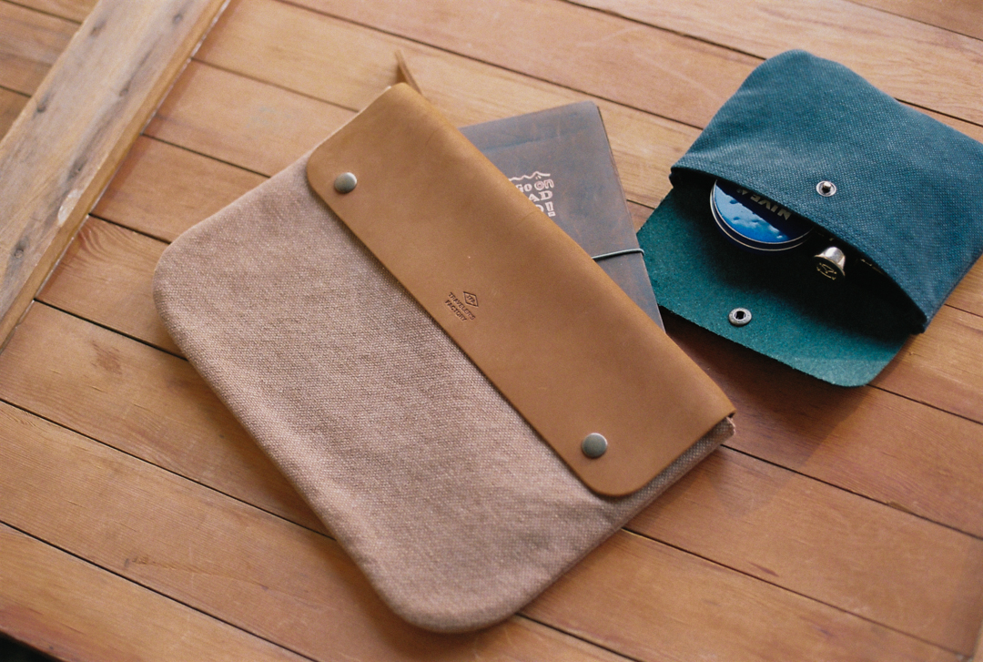 TF Canvas Pouch in M with a TRAVELER'S notebook inside.