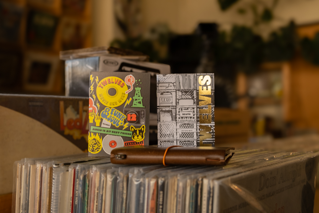 TWELVES RECORD x TRAVELER'S COMPANY collaboration refills (Passport Size) with a TRAVELER'S notebook.