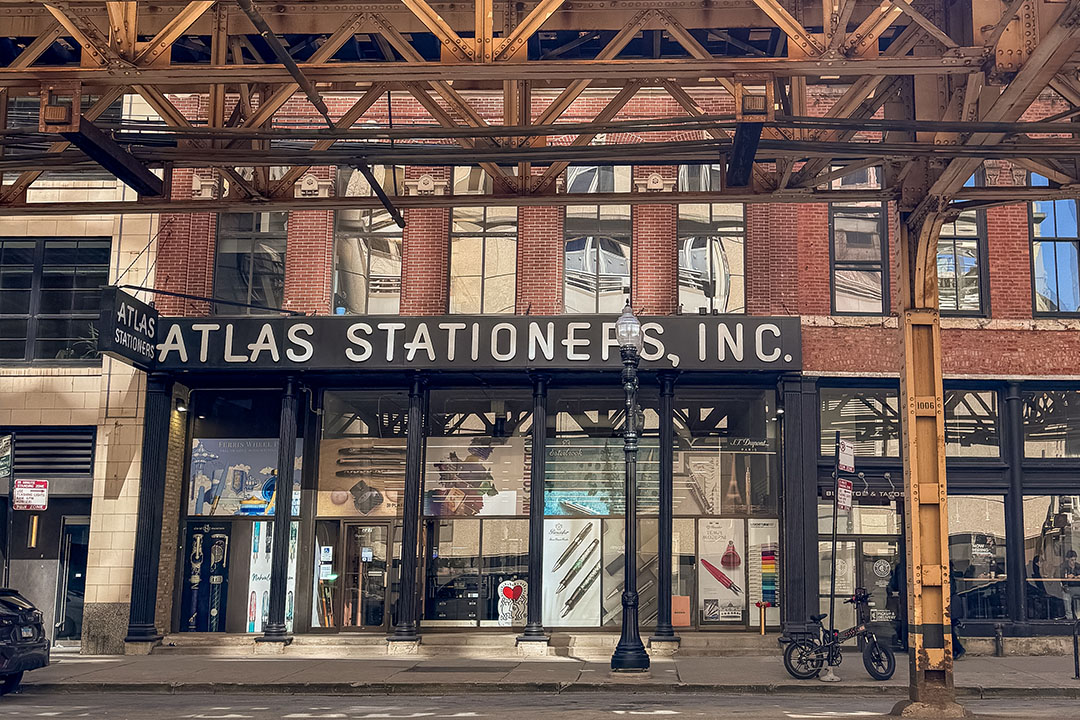The storefront of Atlas Stationers.