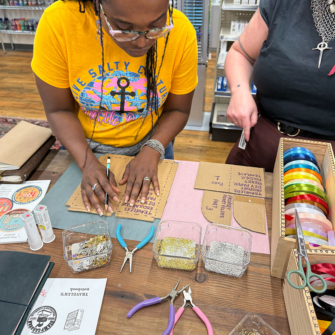 TRAVELER'S notebook fans making paper covers for their refills.