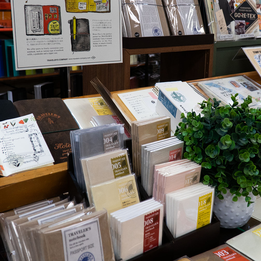 The display of TRAVELER'S notebook and accessories inside the store.