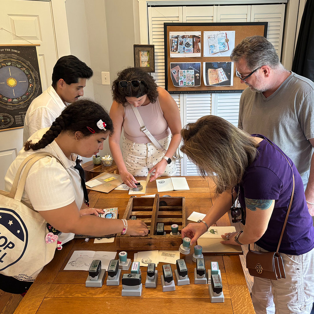 TRAVELER'S notebook fans stamping at the Stamp Caravan event at The Paper Seahorse.