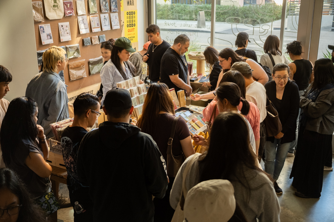 Visitors packed the space, browsing products and connecting with the TRAVELER'S community.