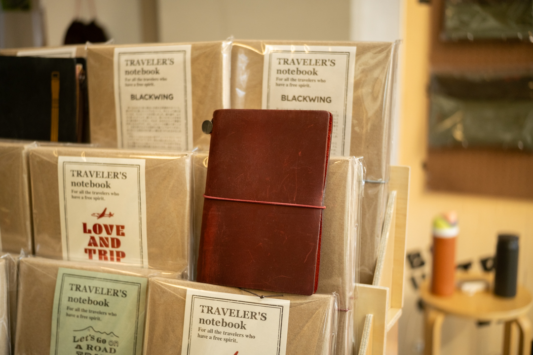Stacks of the event-exclusive tote bags by the window, ready for eager shoppers.