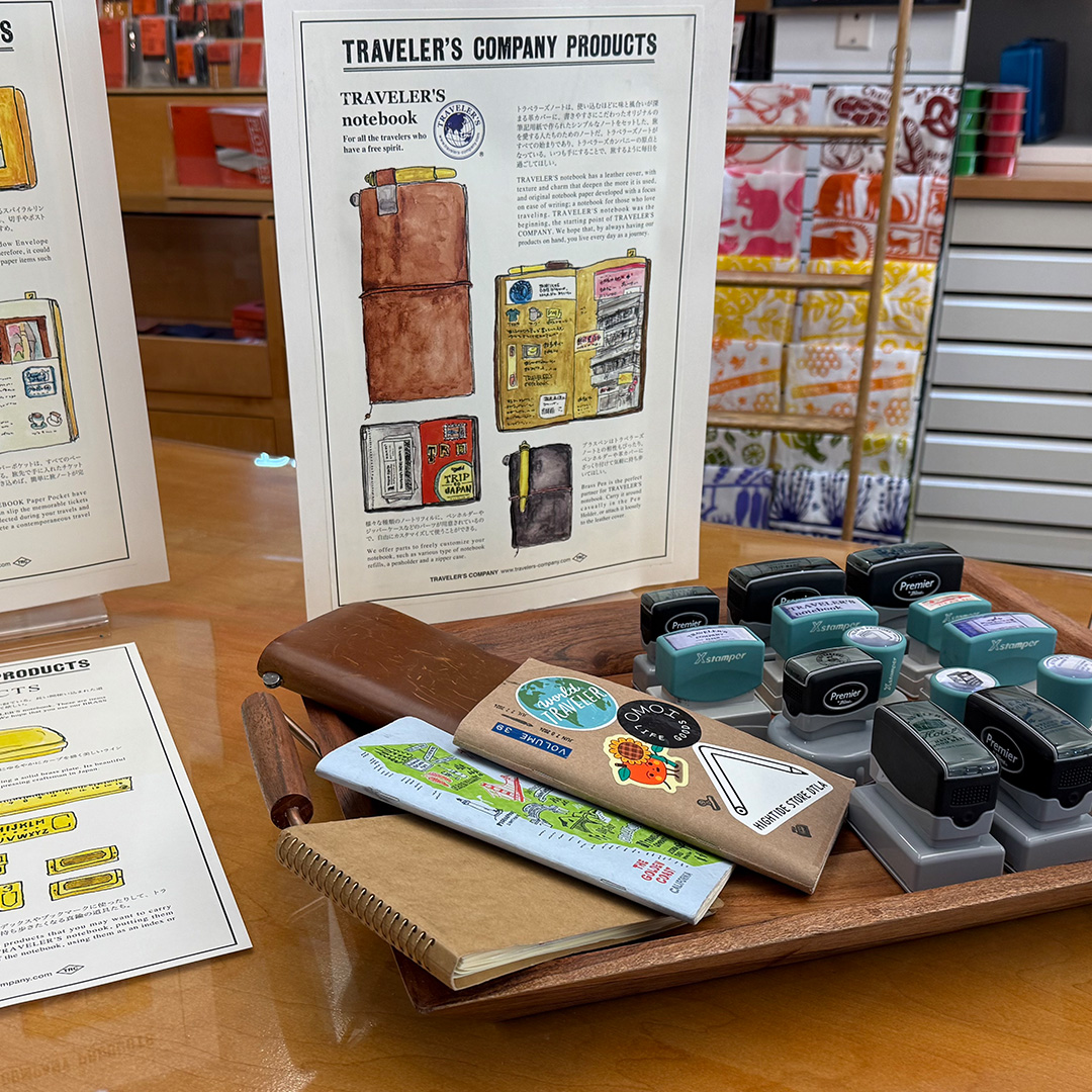 A tray holds TRC stamp caravan stamps as well as samples that people can flip through.