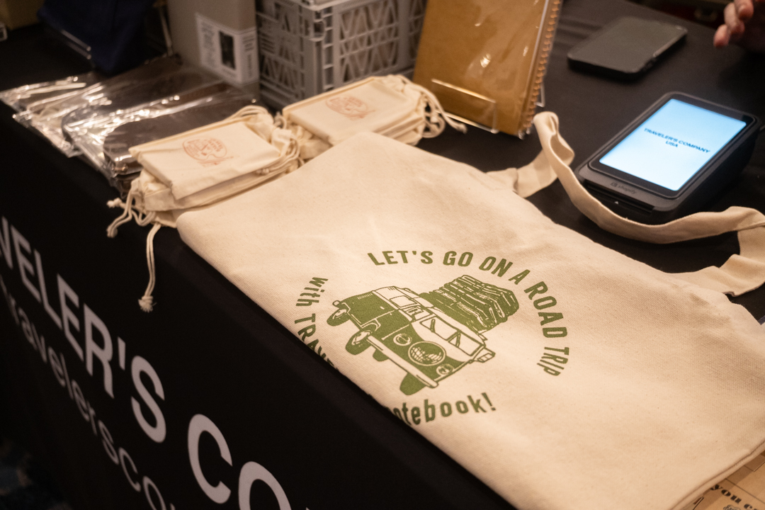 Tote bag being sold at the TRAVELER'S COMPANY USA table at the California pen show.