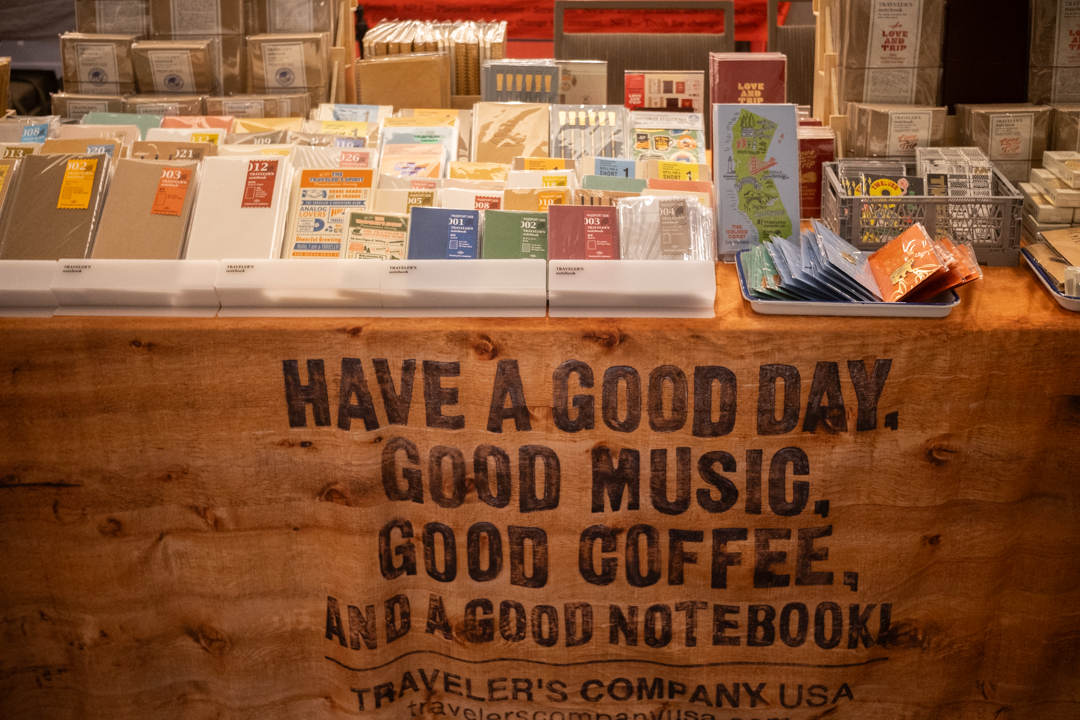Fully stocked notebooks and other stationery at the TRAVELER'S COMPANY USA table at the California pen show.