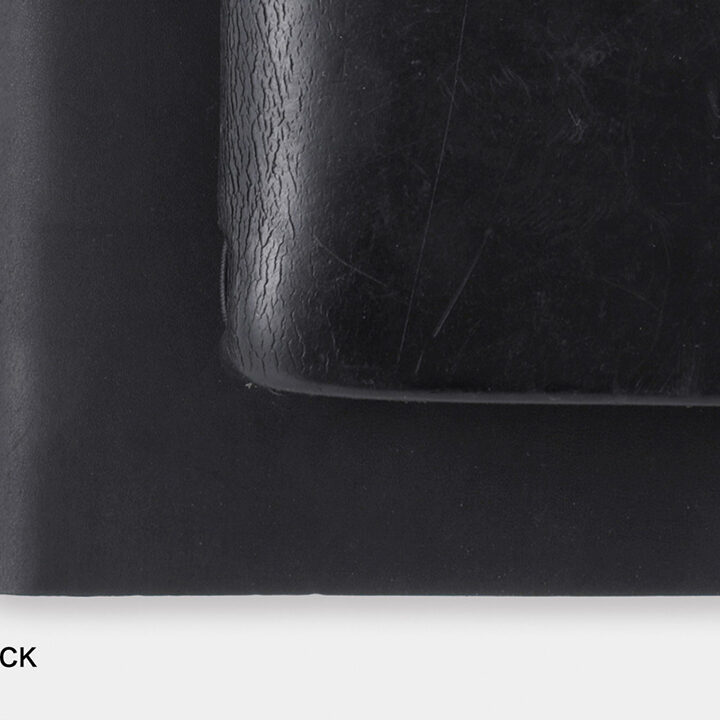 A close-up of a new Black TRAVELER'S notebook beside a used Black TRAVELER'S notebook to showcase the patina and aging process of leather with use and time.