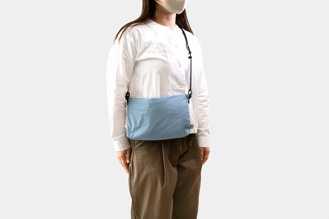 The S-size Shoulder Bag modeled on a woman.