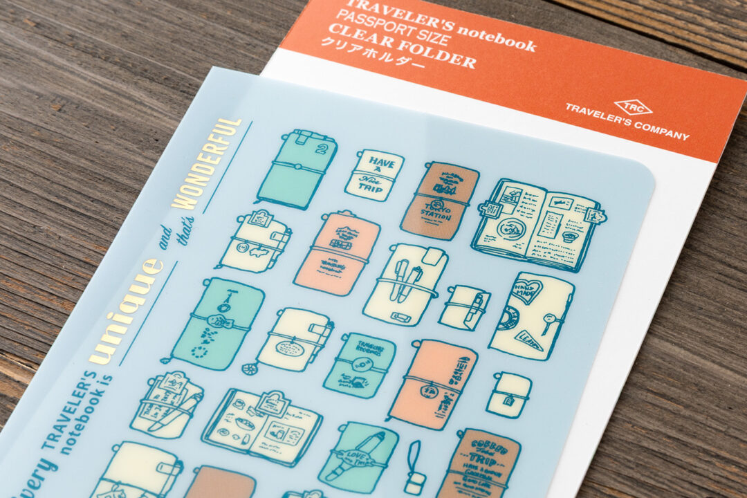 Clear Folder in Passport Size featuring the theme: “Every TRAVELER’S notebook is unique and that’s wonderful.”