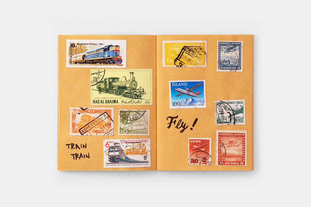A stamp scrapbook spread on yellow paper (Passport Size).