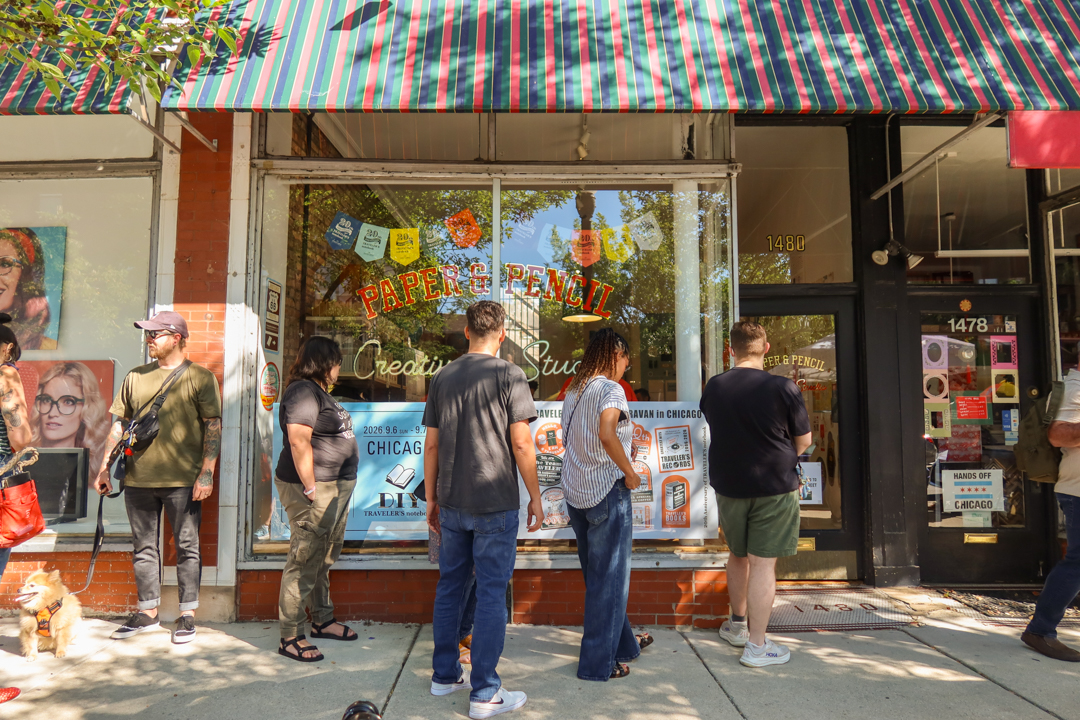 Visitors lined up outside Paper & Pencil store.