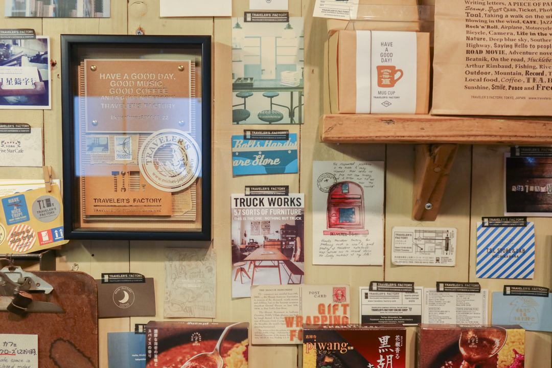 The interior of TRAVELER'S FACTORY Nakameguro filled with TRAVELER'S notebooks, inserts, stationery, and travel memorabilia.